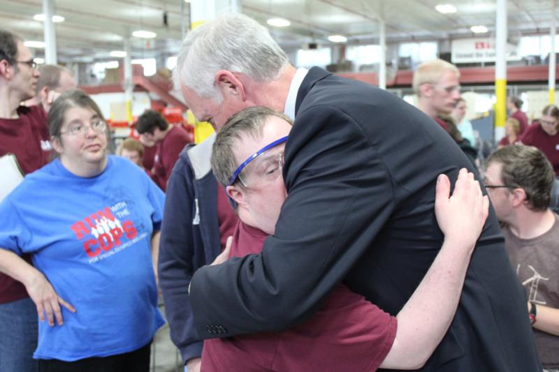 Hugging a worker with special needs
