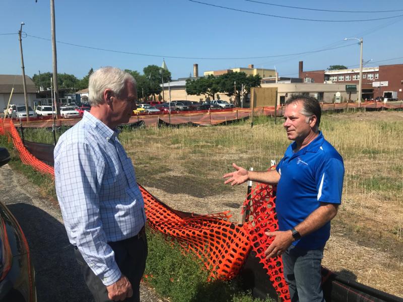 Sen. Johnson at site of burned down furniture store